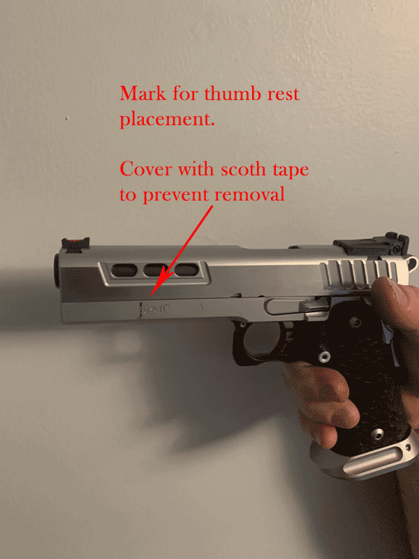 Front mark on thumb rest.